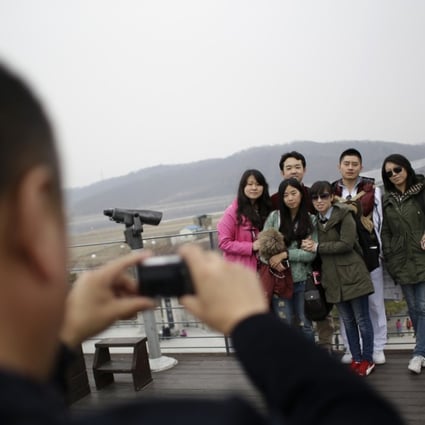 Chinese tourists at the Imjingak Pavilion in Paju, South Korea. Beijing has banned tour groups from visiting the nation in response to the THAAD deployment. Photo: AP