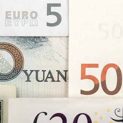 Arrangement of various world currencies including the Chinese yuan, US dollar, the euro, and British ound. Photo: Reuters