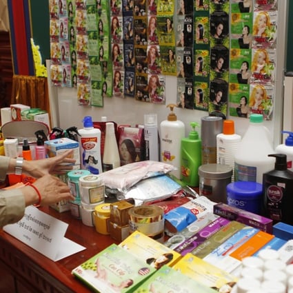 Cambodian authorities have confiscated nearly 70 tonnes of counterfeit cosmetics and raw materials for making them, a major haul that included imitations of South Korean, Thai, Japanese, Chinese and US brands. Photo: EPA