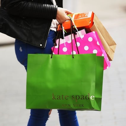Coach, the American maker of high-end luxury goods, announced on Monday that it would buy rival Kate Spade in a US$2.4 billion deal. Photo: AFP