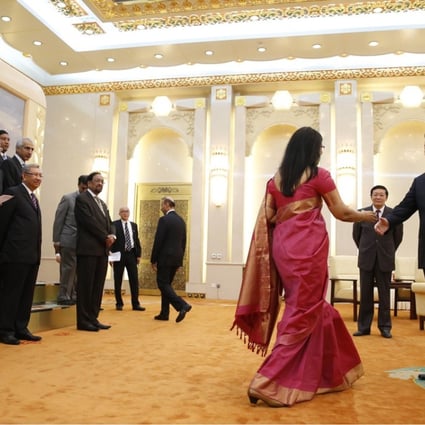 President Xi Jinping (right) meets guests of the Asian Infrastructure Investment Bank at the Great Hall of the People in Beijing in October 2014. Photo: AFP