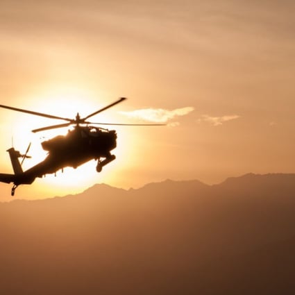 An Army Apache helicopter flies over Afghanistan. US President Donald Trump’s most senior military and foreign policy advisers have proposed a major shift in strategy in Afghanistan that would effectively put the United States back on a war footing with the Taliban. Photo: US Army