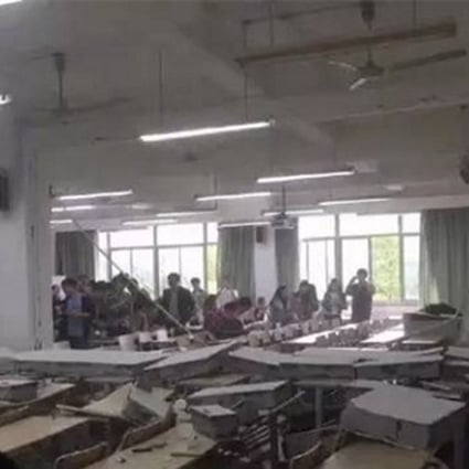 The view across adjacent classrooms after the wall between them collapsed during class. The students were scared but no one was injured. Photo: Handout
