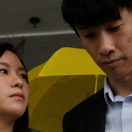 Disqualified pro-independence legislators Yau Wai-ching and Sixtus Baggio Leung, seen outside a court last month, have been charged with unlawful assembly and forceful entry over an attempt to barge into a Legislative Council meeting last November. Photo: Reuters