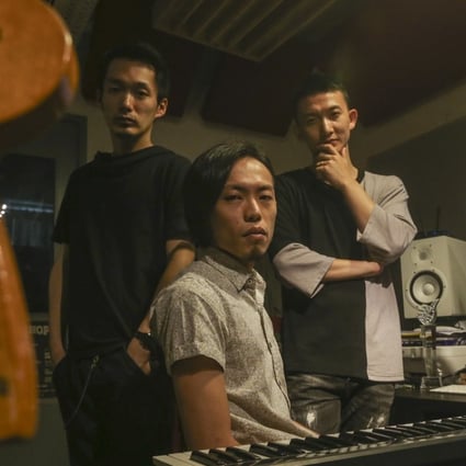 From left: Yuh Egami, Mike Orange and Ricky Hu work on Carmen. Photo: K.Y. Cheng