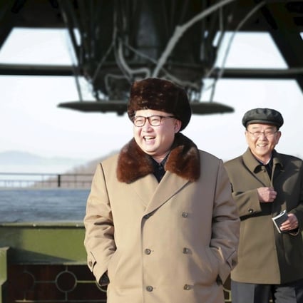 A very pleased Kim Jong-un visits the Sohae Space Centre in North Pyongan province for the testing of a new engine for an intercontinental ballistic missile, in April last year. Photo: KCNA/Reuters