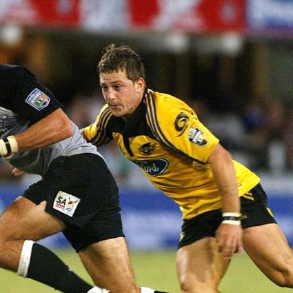 Jimmy Gopperth, right, chases Ruan Pienaar, left. in a 2005 match. Gopperth was named player of the year. Photo: AP