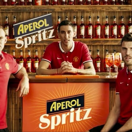 This screen grab from YouTube shows (from left) Wayne Rooney, Angel Di Maria and Michael Carrick in an Aperol Spritz advertisement.