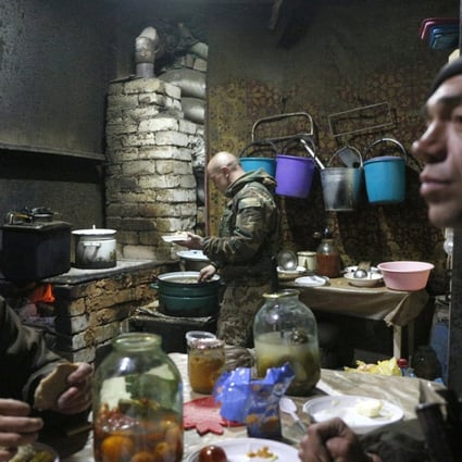 Ukrainian soldiers rest in a shelter near their position on the Butovka Coal Mine in Donetsk area, Ukraine, on Thursday. Photo: EPA