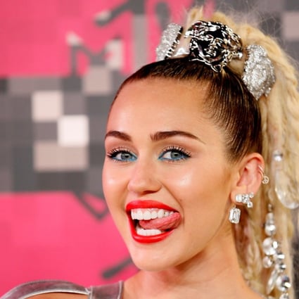 Singer and show host Miley Cyrus arrives at the 2015 MTV Video Music Awards in Los Angeles,. She just released a rock ballad song called Malibu. Photo: Reuters