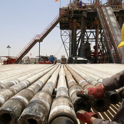 A man works for Iraqi Drilling Company at Rumaila oilfield in Basra, Iraq. US oil major Occidental Petroleum became one of the first companies to approval a shareholder proposal on climate change opposed by management. Photo: Reuters