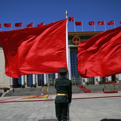 Honour guards hold flags at the Great Hall of the People in Beijing on Saturday as foreign delegates begin arriving for the belt and road forum in Beijing on Sunday and Monday. Photo: EPA