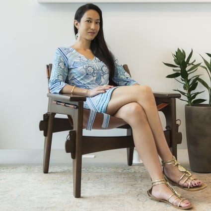 Entrepreneur and wellness expert Vivienne Tang wearing a dress by Emilio Pucci, shoes by Pedder Red, bracelet by Monica Vinader and earrings by Ananda Soul at The Explorer Lounge by Jacada Travel. Photo: Michelle Wong