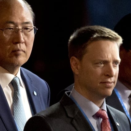 Matt Pottinger (centre), Special Assistant to US President Donald Trump and National Security Council (NSC) Senior Director for East Asia, and Kim Yong Jae (R), North Korea’s minister of external economic relations, arrive for the opening ceremony of the Belt and Road Forum (BRF) at the China National Convention Centre (CNCC) in Beijing, China, 14 May 2017. Photo: EPA