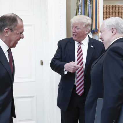 From left, Russia's Foreign Minister Sergei Lavrov, US President Donald Trump, and Russian Ambassador to the United States Sergei Kislyak talk during a meeting in the Oval Office at the White House on Wednesday, May 10. Photo: TNS