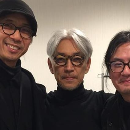 Former radio DJ and music critic Wong Chi-chung with musician Ryuichi Sakamoto and Hong Kong photographer Wing Shya.