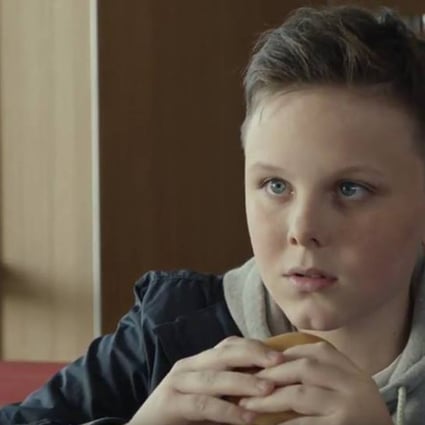 The young star of a McDonald's ad finally finds something he had in common with his dead father - a love of the Filet-O-Fish burger. Photo: YouTube
