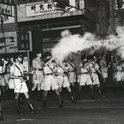 Riot police shoot tear gas to disperse troublemakers in Hong Kong’s North Point area in July 1967. Photo: SCMP