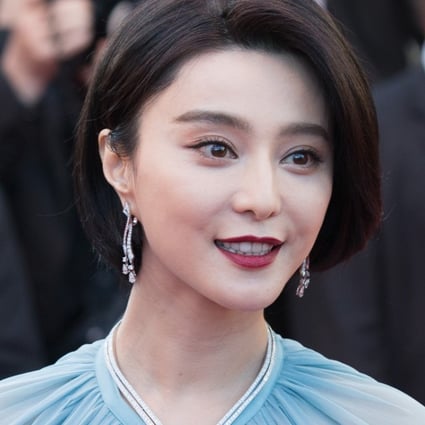 Jury member for the 70th Cannes International Film Festival Fan Bingbing Wang Luodan poses on the red carpet at the opening of the 70th Cannes International Film Festival. Photo: Xinhua