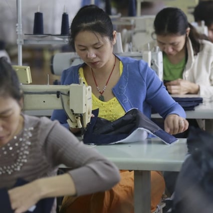 Workers at a factory in Jiujiang, in China’s Jiangxi province, produce clothing destined for the EU.
