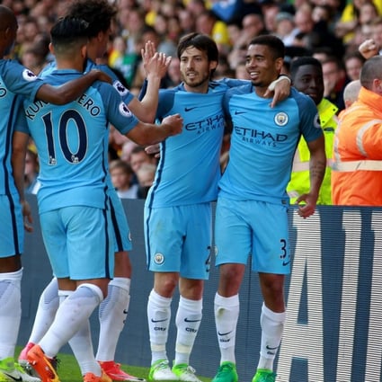 Manchester City players celebrate Gabriel Jesus’ goal during their Premier League against Watford. Photo: EPA