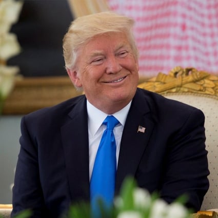 US President Donald Trump has coffee during a reception ceremony in Riyadh, Saudi Arabia, on Saturday. Close to 40 per cent of the US population still support him. How could this be so, given his frequent distortion of facts coupled with his bombastic narcissism? Photo: Saudi Royal Court handout via Reuters