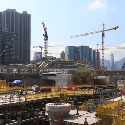 Work continues on the West Kowloon terminus of the Guangzhou-Shenzhen-Hong Kong express rail link. Photo: K. Y. Cheng
