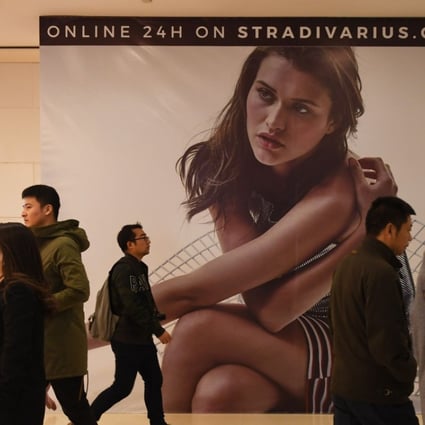 Digitalisation further encourages integration between online and offline retail channels, making store fronts more as marketing and experience shopping platforms. Photo: AFP