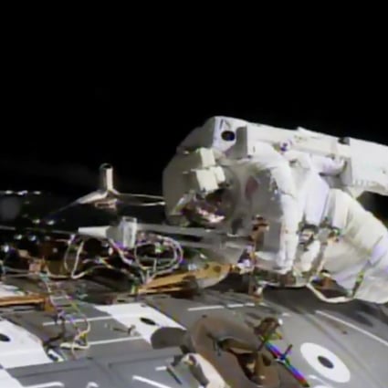 In this NASA provided frame from video, NASA astronaut Jack Fischer works to install antennas at the International Space Station. A Chinese national was arrested trying to procure and send US space technology to China. Photo: NASA via AP