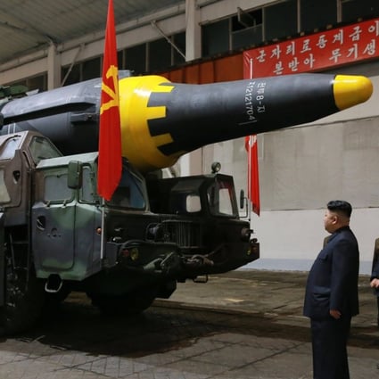 North Korean leader Kim Jong-un inspects a missile after Pyongyang said it had successfully test-fired a new ground-to-ground medium long-range strategic ballistic rocket on May 14. Photo: EPA