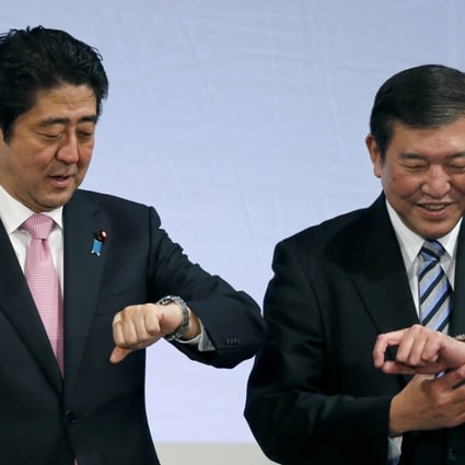 Shigeru Ishiba (right), a heavyweight of the ruling Liberal Democratic Party has started a gradual campaign to usurp Shinzo Abe as party leader and prime minister. Photo: AP