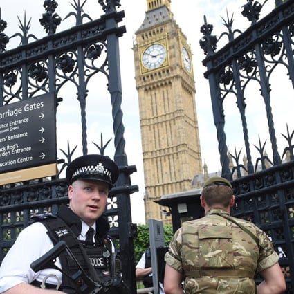 British Army soldiers along with armed police patrol the streets near the Houses of Parliament in London, Britain, on May 24, 2017. Britain criticised the US for leaks in the investigation of the Manchester terror attack. Photo: EPA