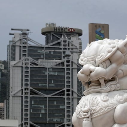 Moody's has cut its credit rating for Hong Kong, hours after downgrading China for rising debt levels, which it said would have "significant impact" on the Asian financial hub because of their close links. Photo: AP