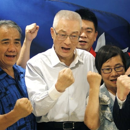Wu Den-yih (centre) and his supporters declare victory in the election for Kuomintang chairman, in Taipei on May 20. Photo: AP