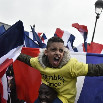 Supporters of French President Emmanuel Macron during the election campaign. Photo: EPA