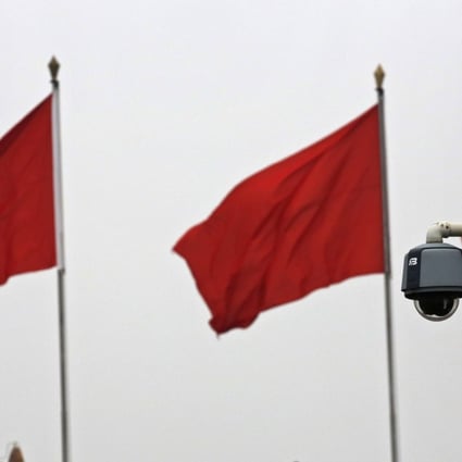 A security camera keeps watch over Tiananmen Square in Beijing. Activists say they already face extensive surveillance by security agents and cameras outside their homes. Photo: Reuters
