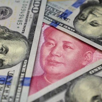 The PBOC has been setting the yuan reference rate with a strong bias in the past month or so, but the spot rate has generally kept trading at a weaker level than the fix, suggesting that onshore market demand for dollars remained strong and pointing to lingering yuan depreciation pressure. Photo: Reuters