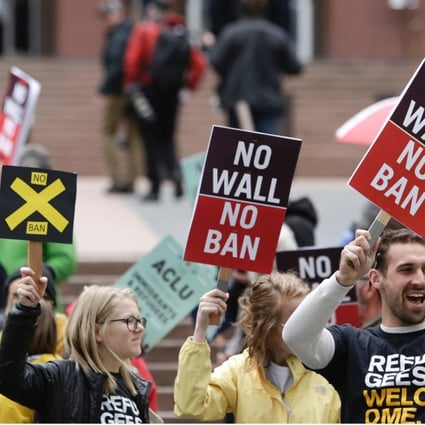 People protest outside as the 9th US Circuit Court of Appeals as it heard arguments on US President Donald Trump's revised travel ban in Seattle, Washington, on May 15. Photo: AFP