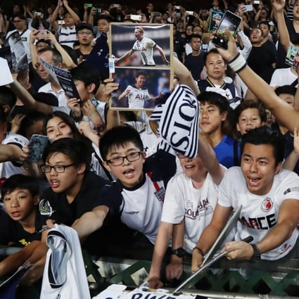 Tottenham Hotspur fans cheer their team in Hong Kong. Photo: SCMP / Nora Tam
