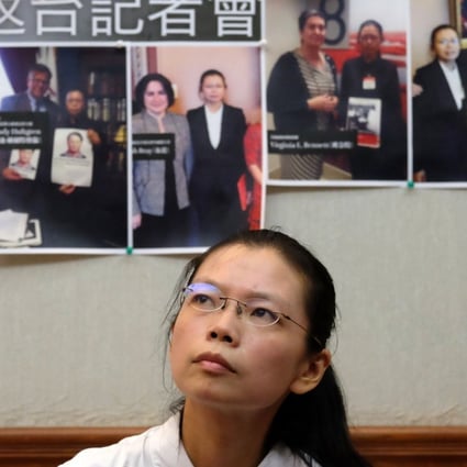 Li Ching-yu, wife of Taiwanese activist Li Ming-che, says her husband visited the mainland once a year. Photo: AFP