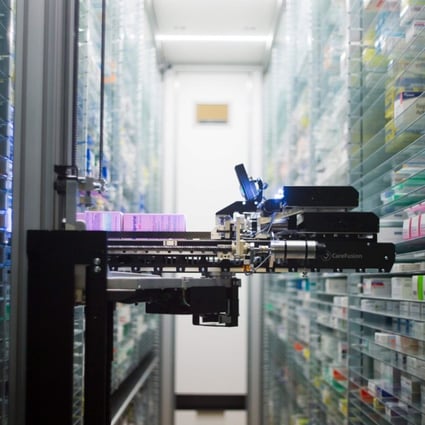 A robot retrieving medicines in the pharmacy of the Argenteuil hospital, in Argenteuil, a Paris suburb, in 2013. Technology has long affected the labour force, but recent advances in artificial intelligence and robotics have heightened concerns on automation replacing a growing number of occupations including highly skilled or “knowledge-based” jobs. Photo: AFP