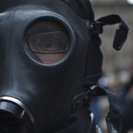 A file picture of demonstrator wearing a gas mask during a protest in New York. Photo: Reuters
