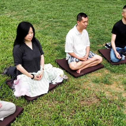Professionals from different walks of life take part in a mindfulness retreat camp in Wu Kai Sha, Ma On Shan, in May 2013. But apart from face-to-face therapy, even online mindfulness and cognitive behavioural therapy training programmes can offer sustained benefits, a Chinese University study has shown. Photo: Thomas Yau