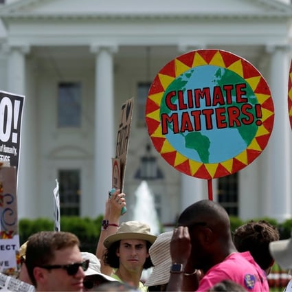 Protesters take part in the People’s Climate March at the White House in Washington on April 29. Photo: Reuters