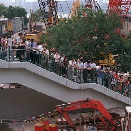 Buyers queuing on the Causeway Bay overpass to register for the chance to buy the Villa Esplanada residential development in Tsing Yi on June 4, 1997. Photo: SCMP