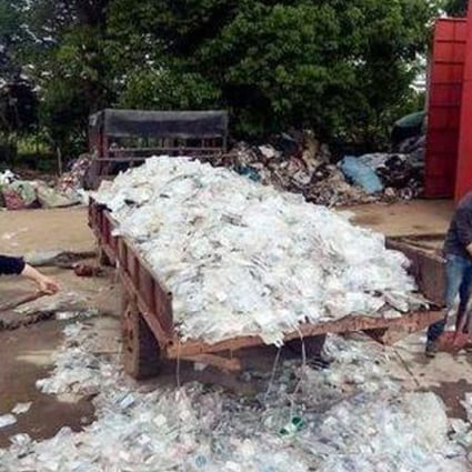 Piles of medical waste were found at a workshop in Miluo, Hunan province. Photo: Handout