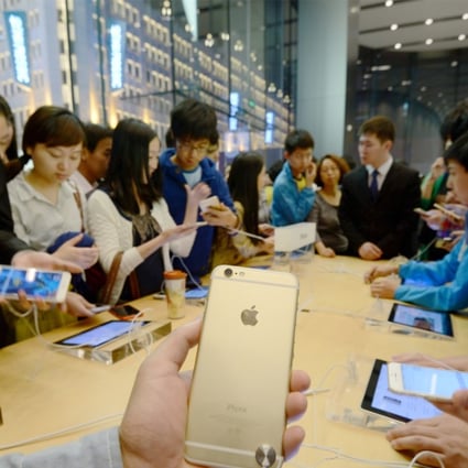 iPhones are all the rage in China, but they cost more than a new graduate’s monthly salary. Photo: Imaginechina