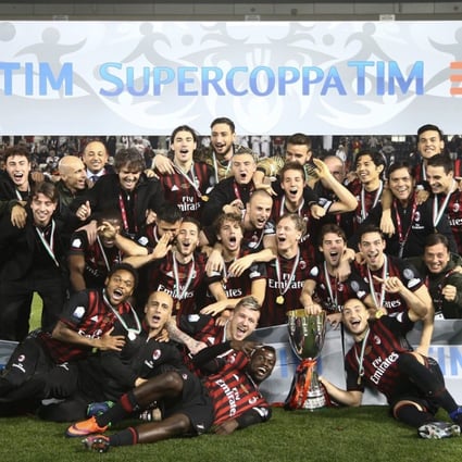 AC Milan players celebrate a win over Juventus in the Italian Super Cup final last year. In April, mainland investment company Sino-Europe Sports, headed by businessman Li Yonghong, invested €740 million in AC Milan. Photo: EPA