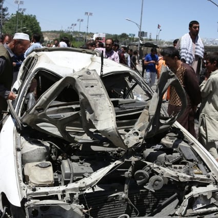 A crowd gathers at the site of a car bomb explosion in Kabul on May 31. Photo: Xinhua
