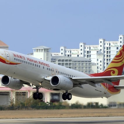 A Hainan Airlines plane takes off from the Sanya Phoenix International Airport in Sanya, Hainan province. Photo: Reuters